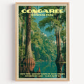 Cedar Creek Congaree National Park vintage poster in a light oak frame on a plain white wall