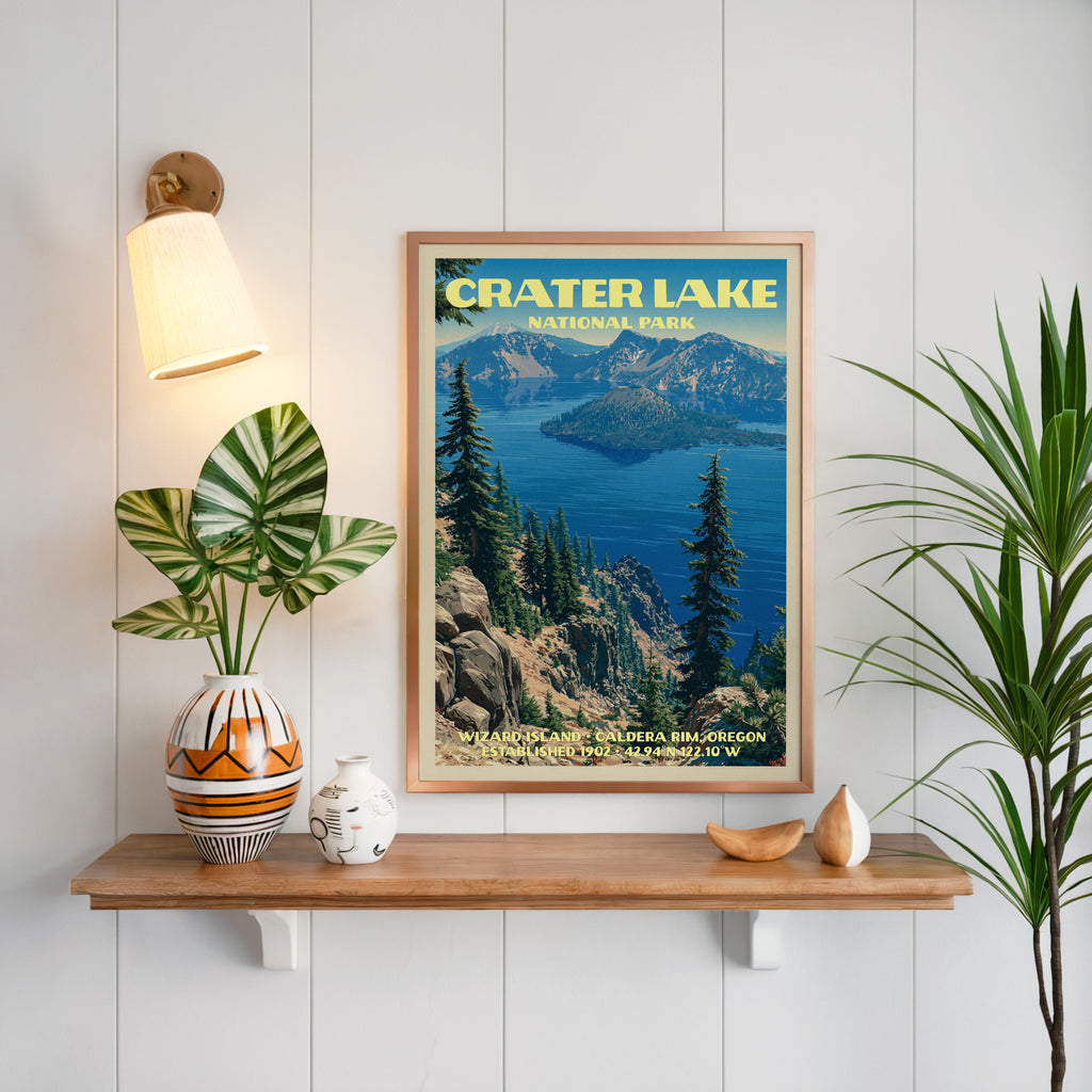 Wizard Island Crater Lake print framed on white panelling above an oak shelf with a patterned vase and sconce