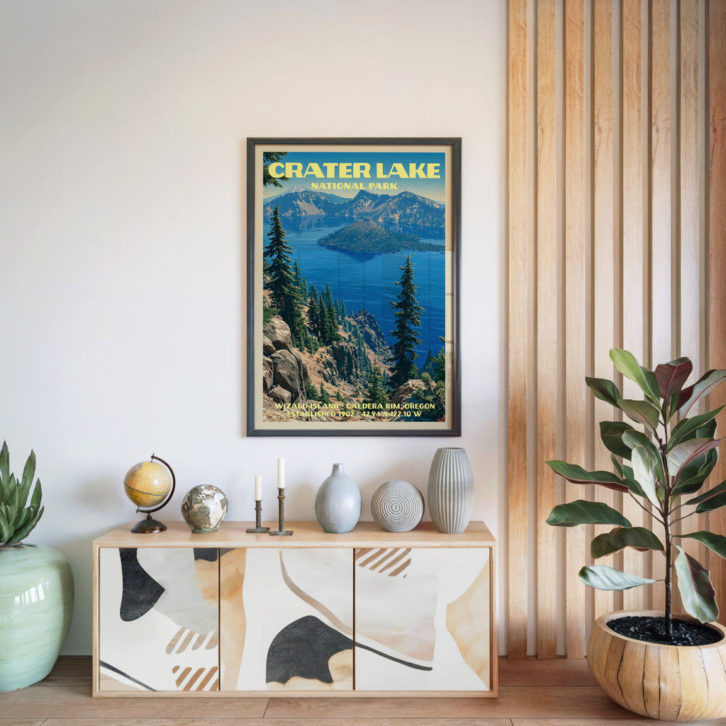 Crater Lake National Park poster in a black frame above a light wood sideboard by a slatted wall panel