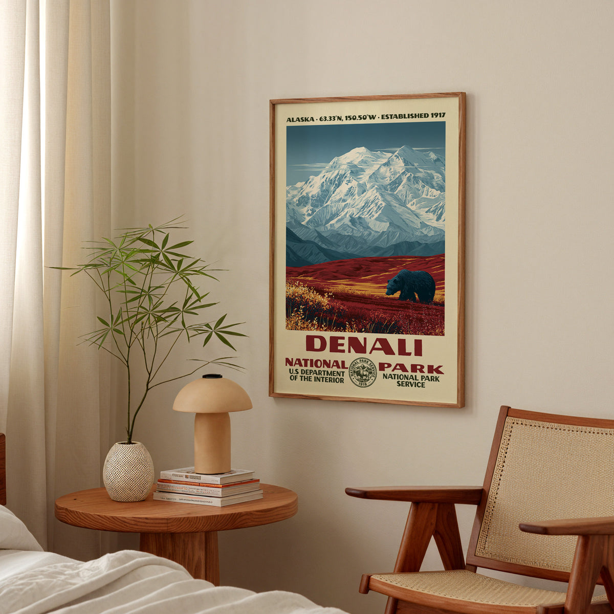 Denali National Park vintage WPA print hanging above a side table in a calm bedroom corner
