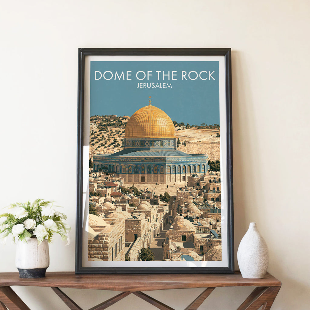 Dome of the Rock Jerusalem travel poster in a black frame on a wooden console table with white flowers