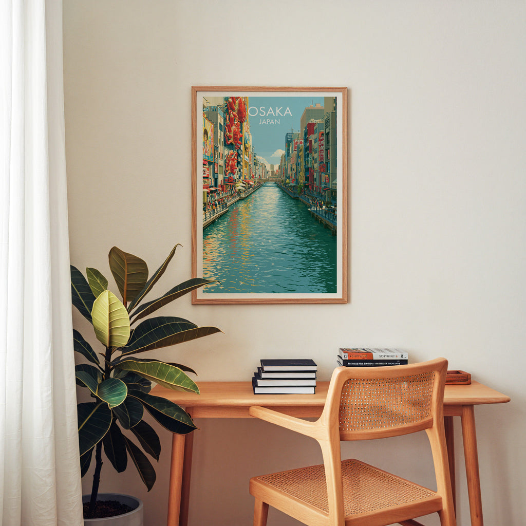 Dotonbori Osaka Japan wall art above a wooden home office desk with a rattan chair and books