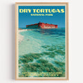 Fort Jefferson Dry Tortugas vintage poster in a light oak frame on a plain white wall