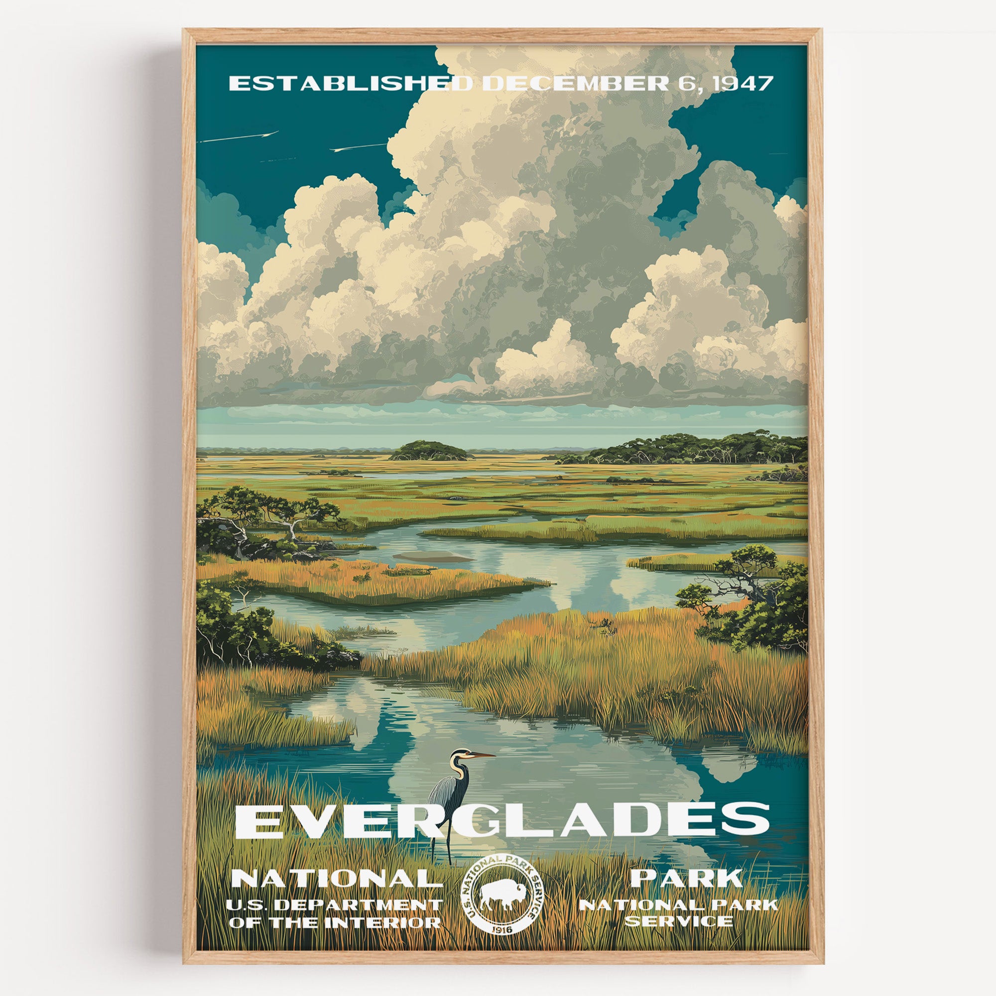 Everglades National Park vintage travel poster in a wood frame, a heron in a wide golden sawgrass marsh under towering clouds