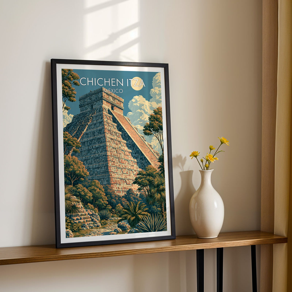 Sunlit limestone steps of El Castillo, black frame on a wood shelf with yellow daisies on a cream wall