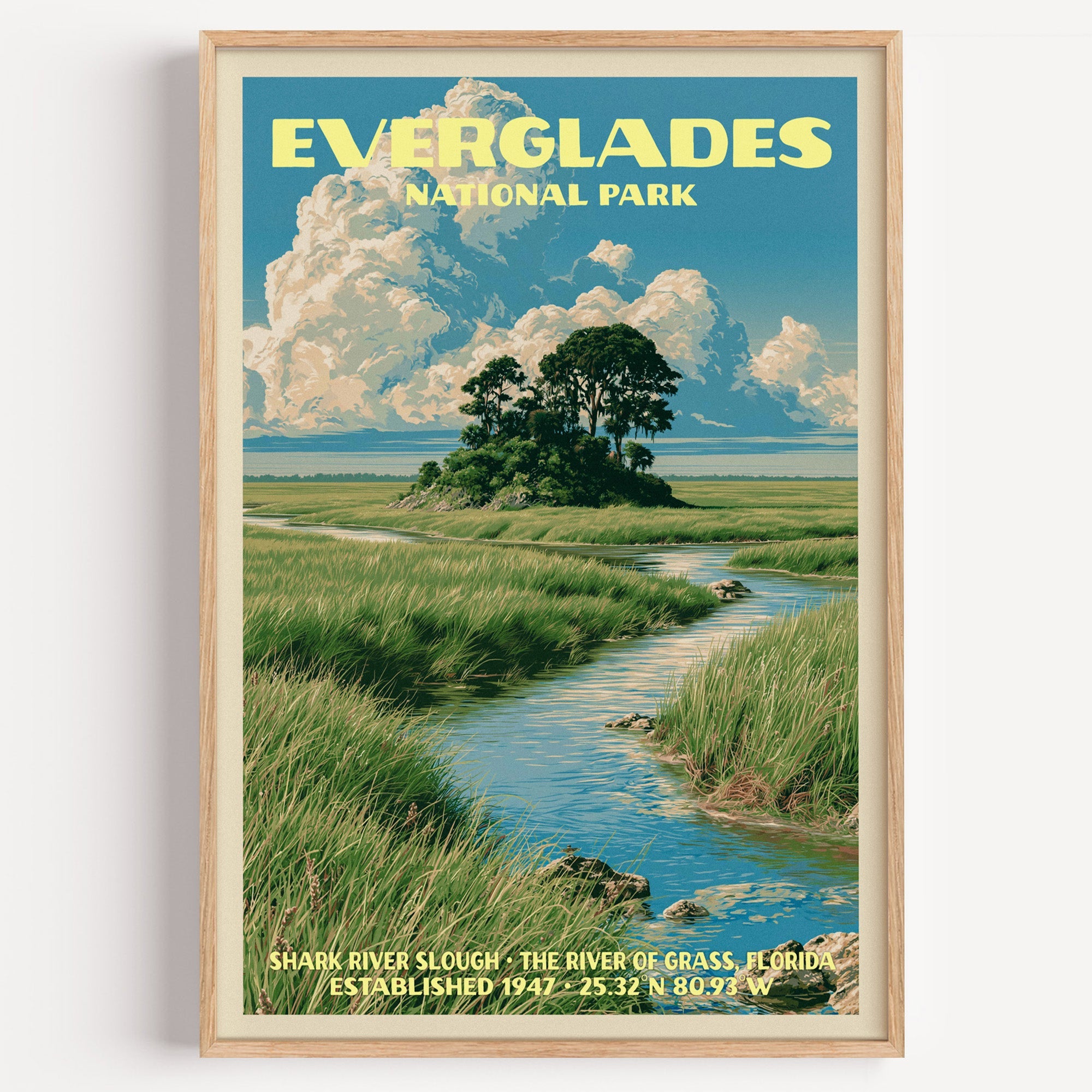 Shark River Slough Everglades vintage poster in a light oak frame on a plain white wall