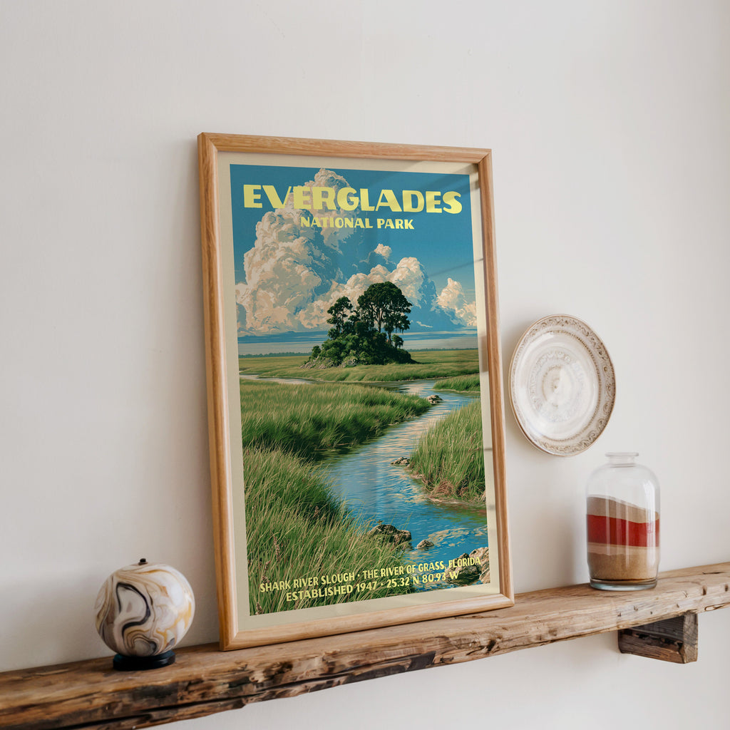 Everglades Shark River Slough print in oak, leaning on a reclaimed wood ledge with a stone sphere and sand jar