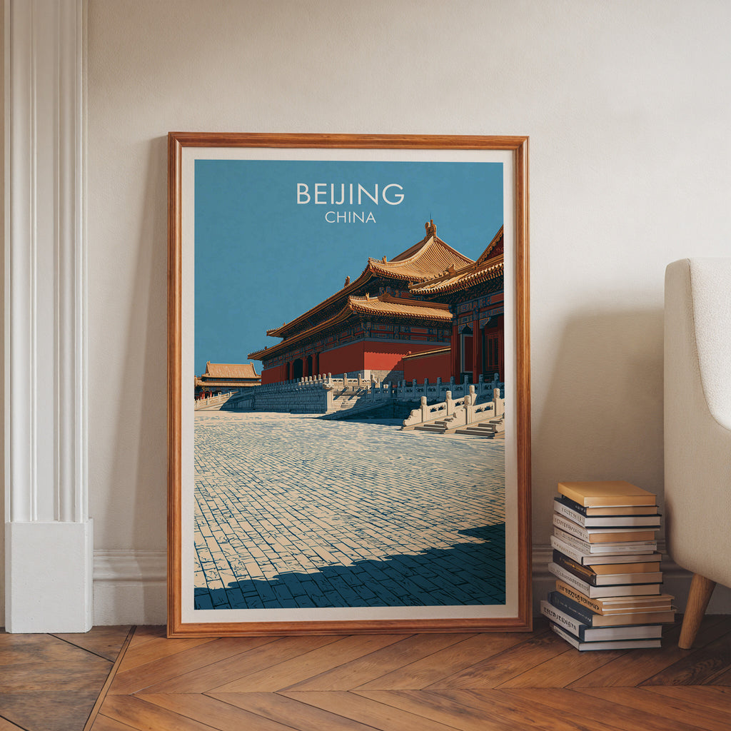Forbidden City Beijing China art print in a walnut frame leaning in a hallway beside stacked books