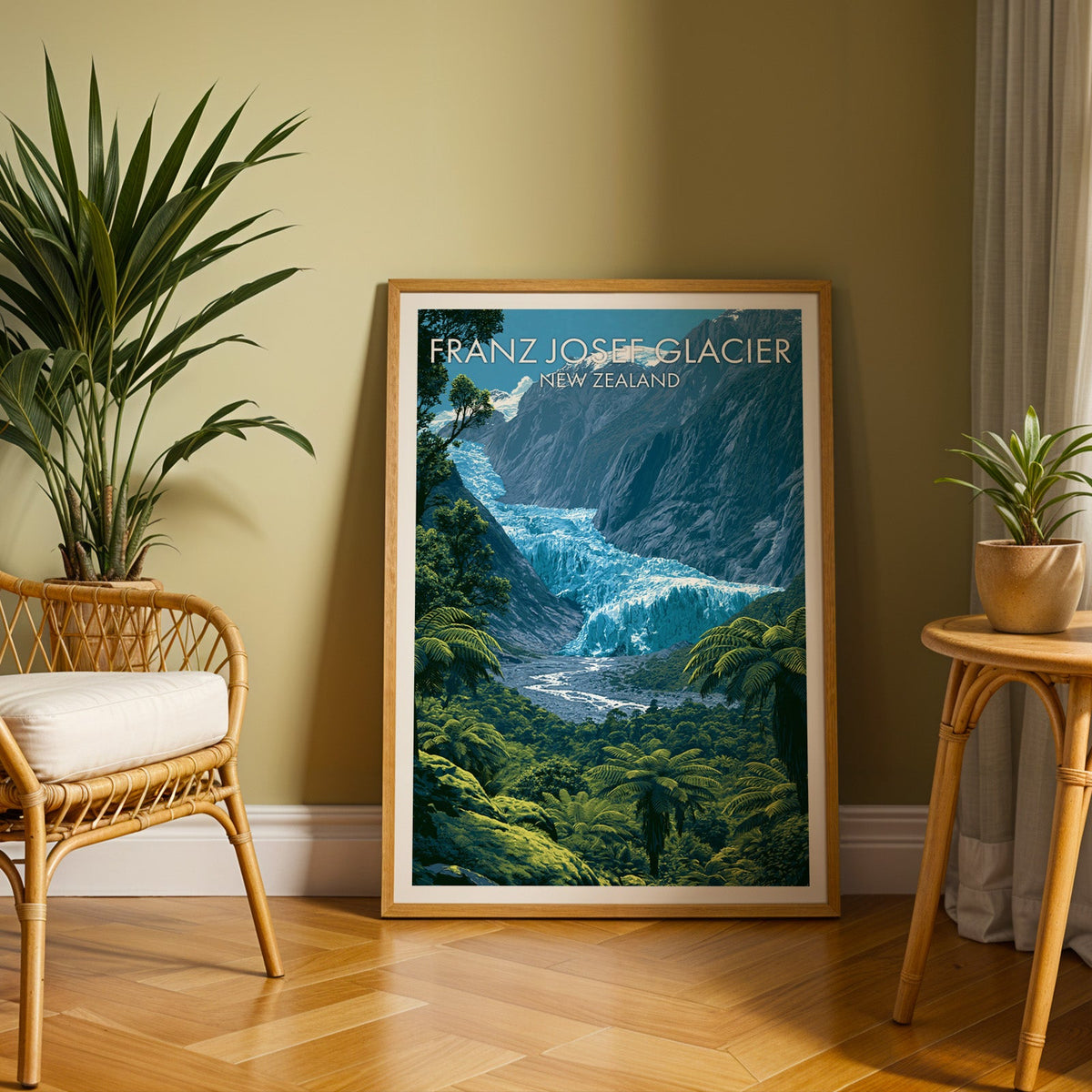 Ice valley art in an oak frame on herringbone parquet with an olive wall and rattan chair