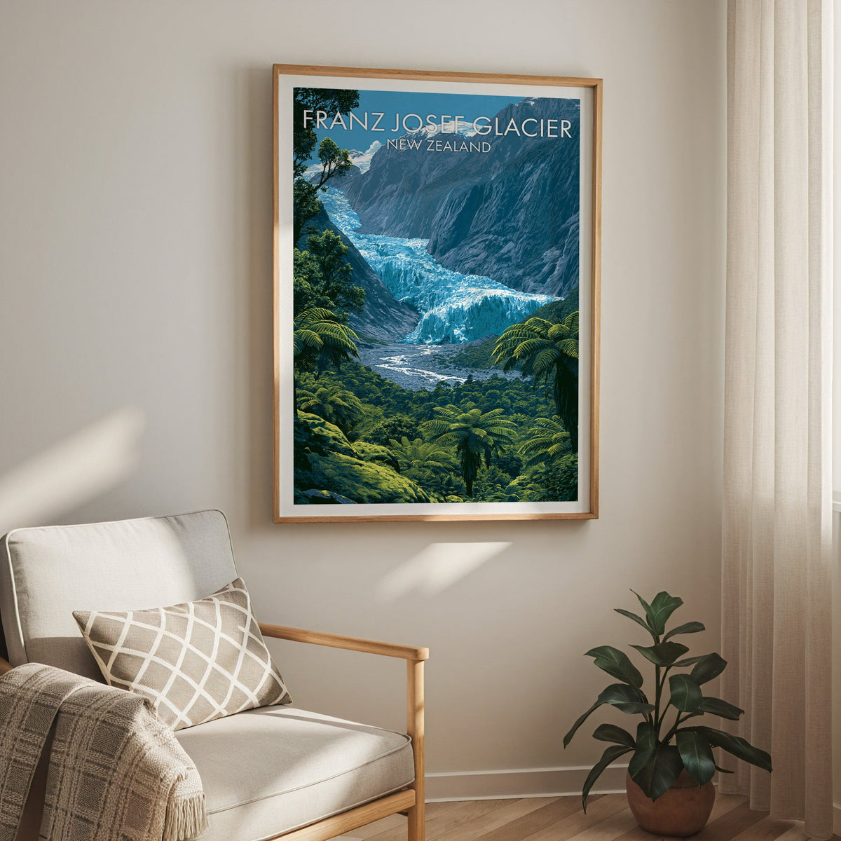 Turquoise glacier print in oak above a cream armchair with a sheer curtain and rubber plant
