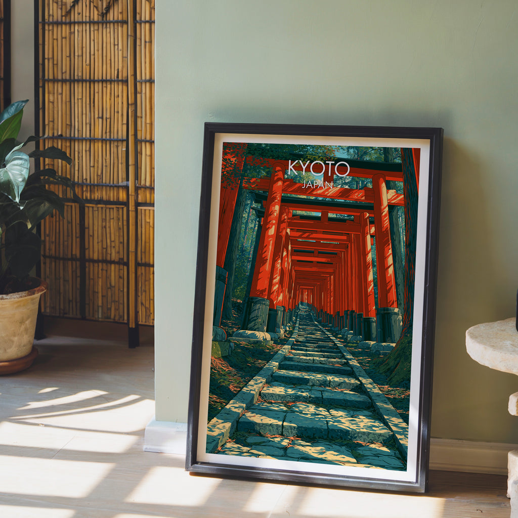Fushimi Inari Kyoto Japan wall art in a black frame leaning against a sage green wall beside a bamboo screen
