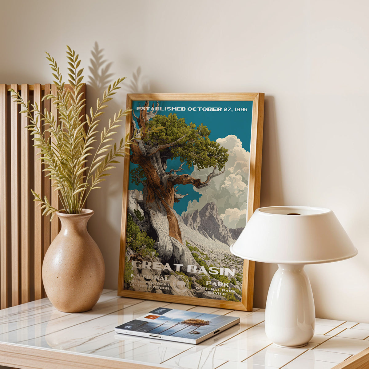 Great Basin National Park vintage print leaning on a table with a ceramic lamp and dried grasses