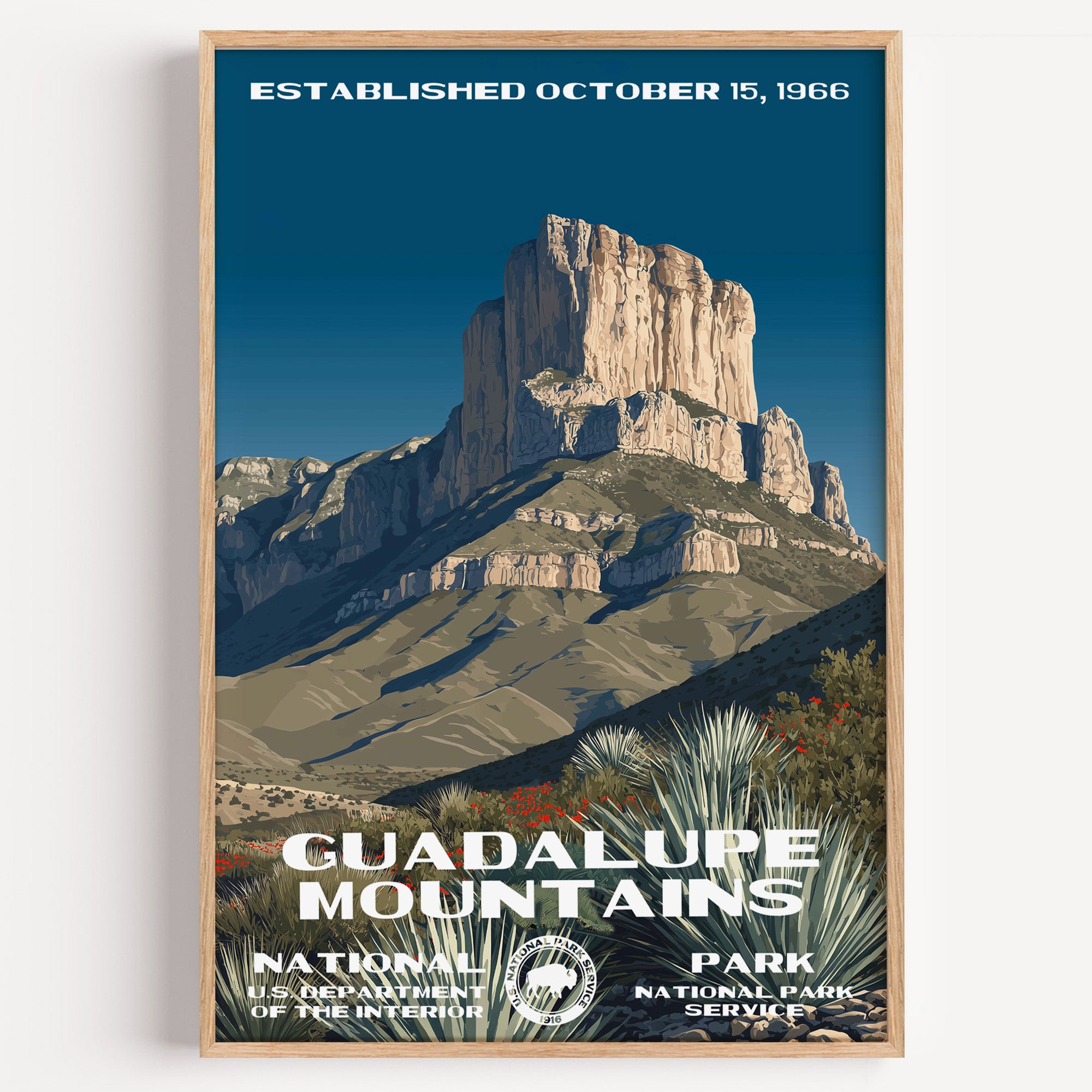 Guadalupe Mountains National Park vintage travel poster in a wood frame, the white limestone face of El Capitan rising