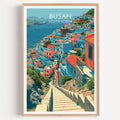 Gamcheon Culture Village Busan travel poster in a natural wood frame, shown against a clean white wall