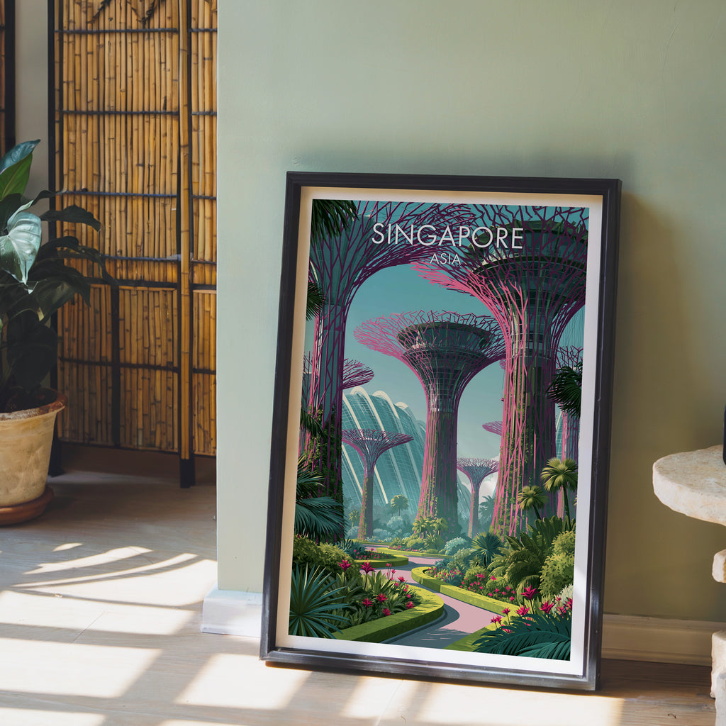 Gardens by the Bay Singapore wall art in a black frame leaning against a sage green wall beside a bamboo screen