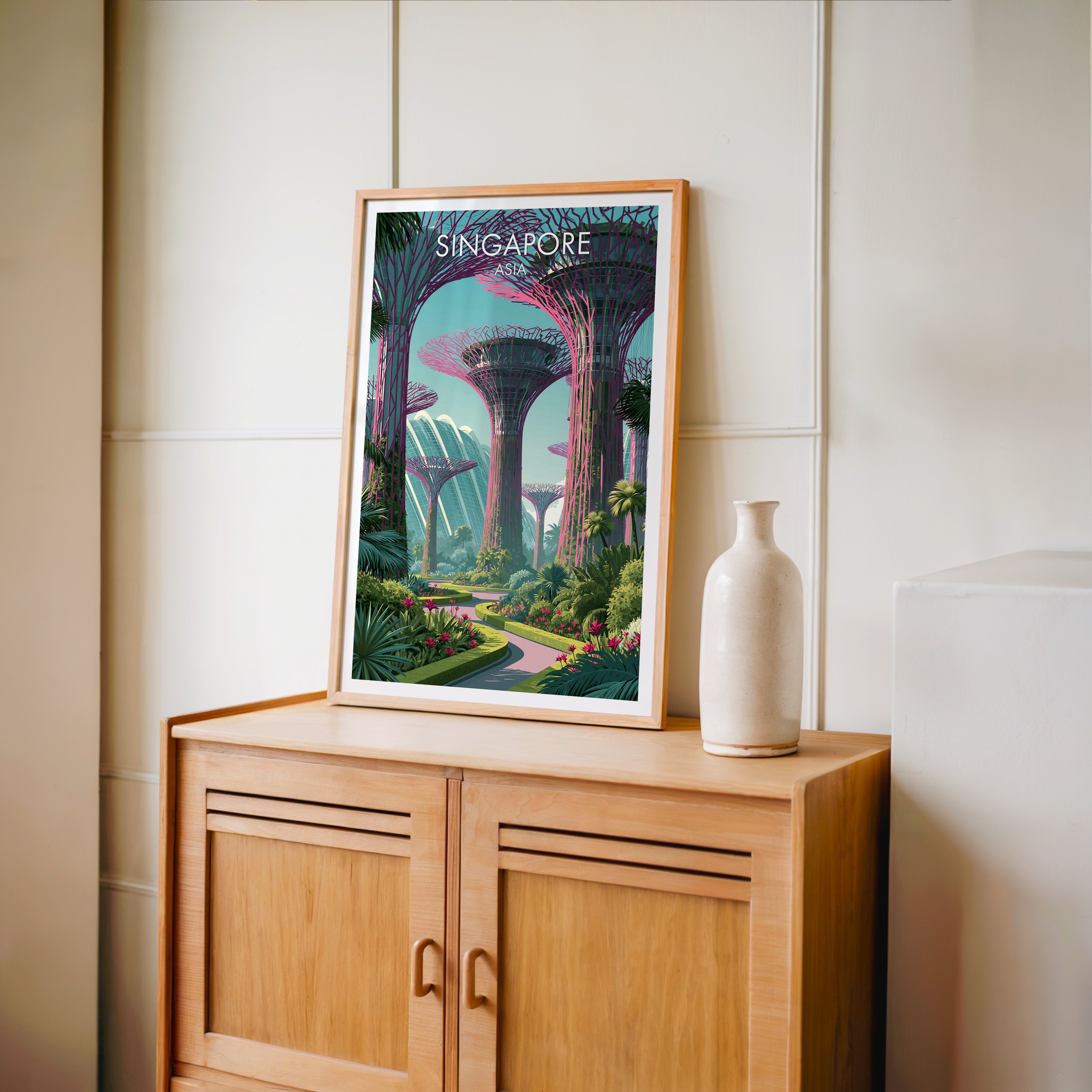 Small Gardens by the Bay Singapore travel poster in an oak frame on a mid-century sideboard with a ceramic vase