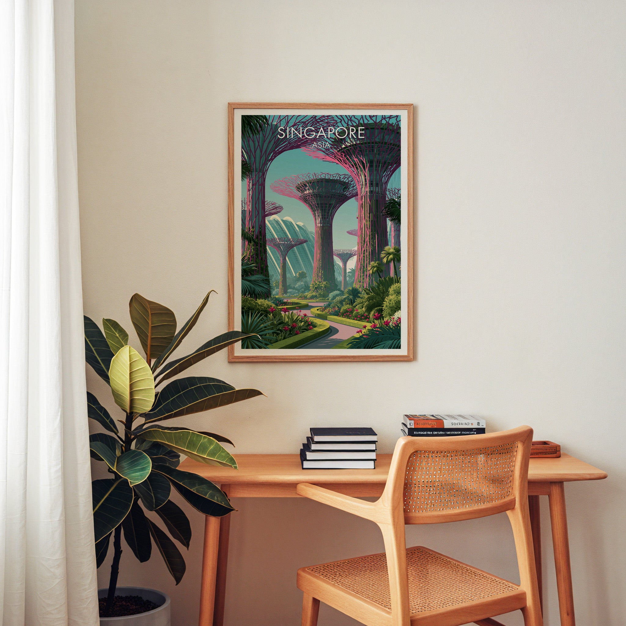 Gardens by the Bay Singapore wall art above a wooden home office desk with a rattan chair and books