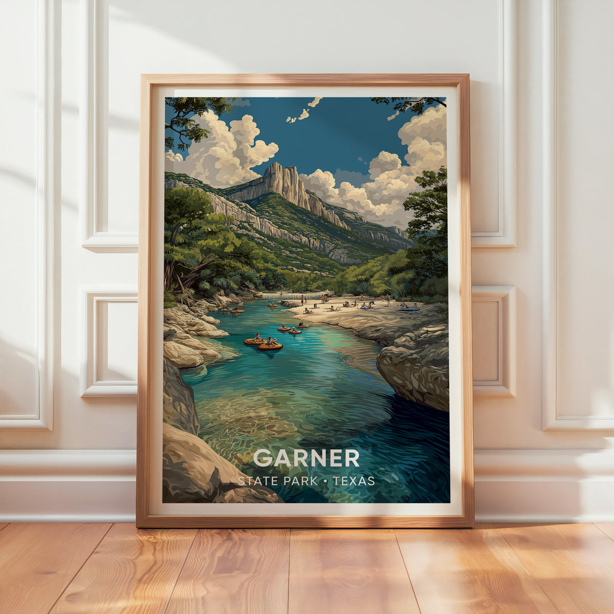 Garner State Park print in an oak frame propped on a textured white wall, sunlight across the wood floor.