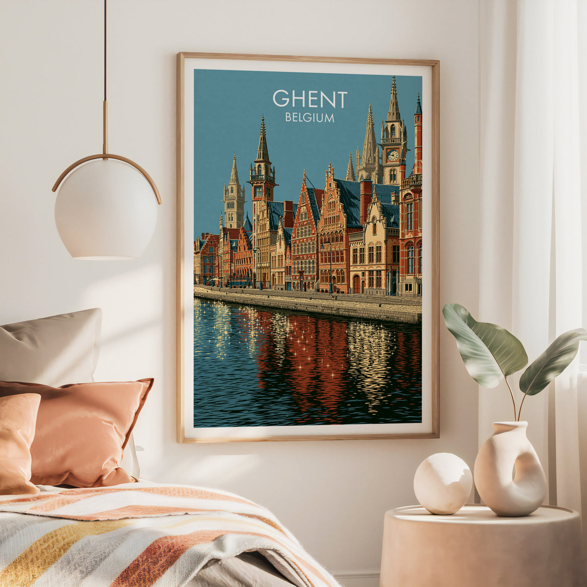 Ghent canal wall art, large oak frame above a bed with rust bedding and a brass globe pendant