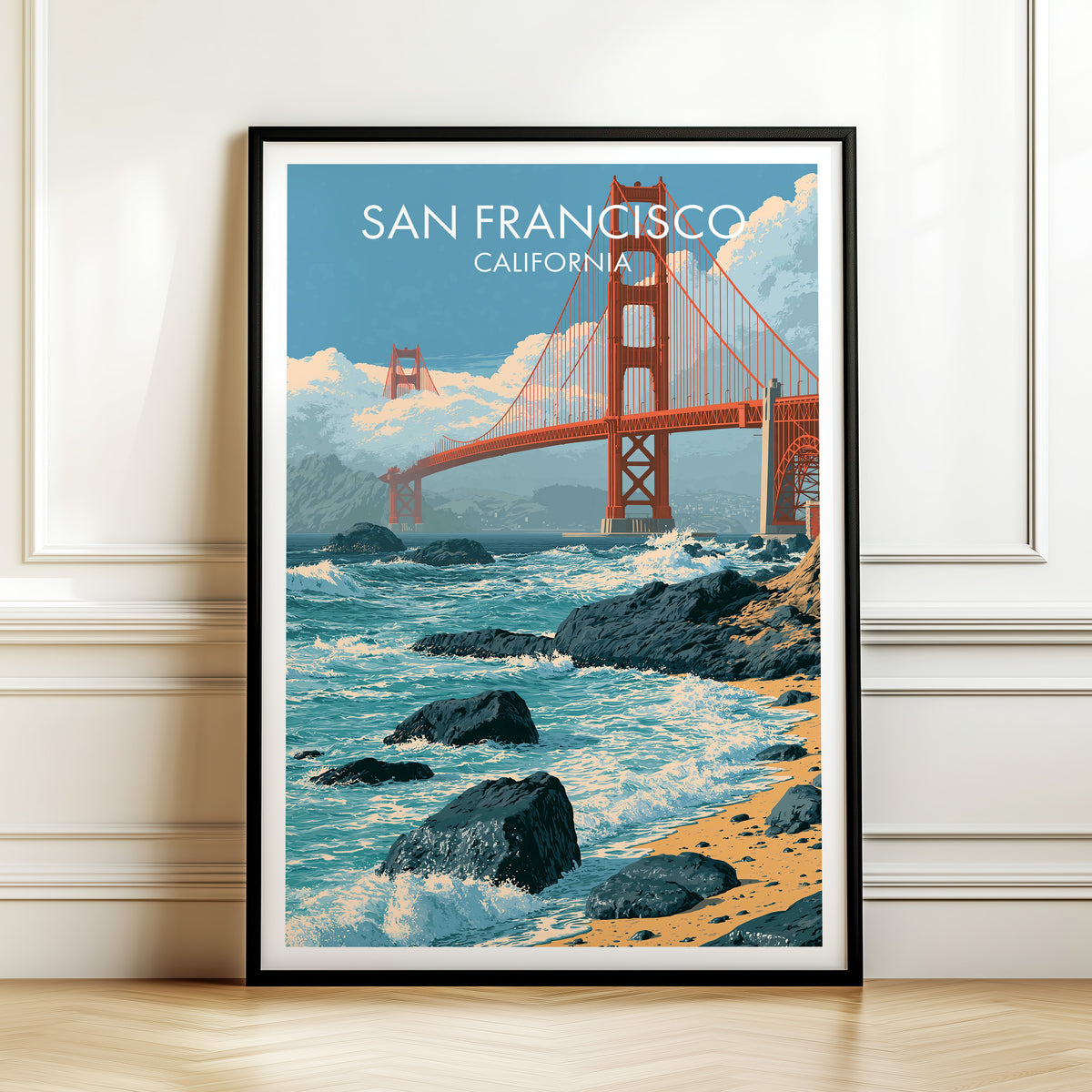 Baker Beach canvas print in a black frame leaning on a panelled wall above a herringbone floor.
