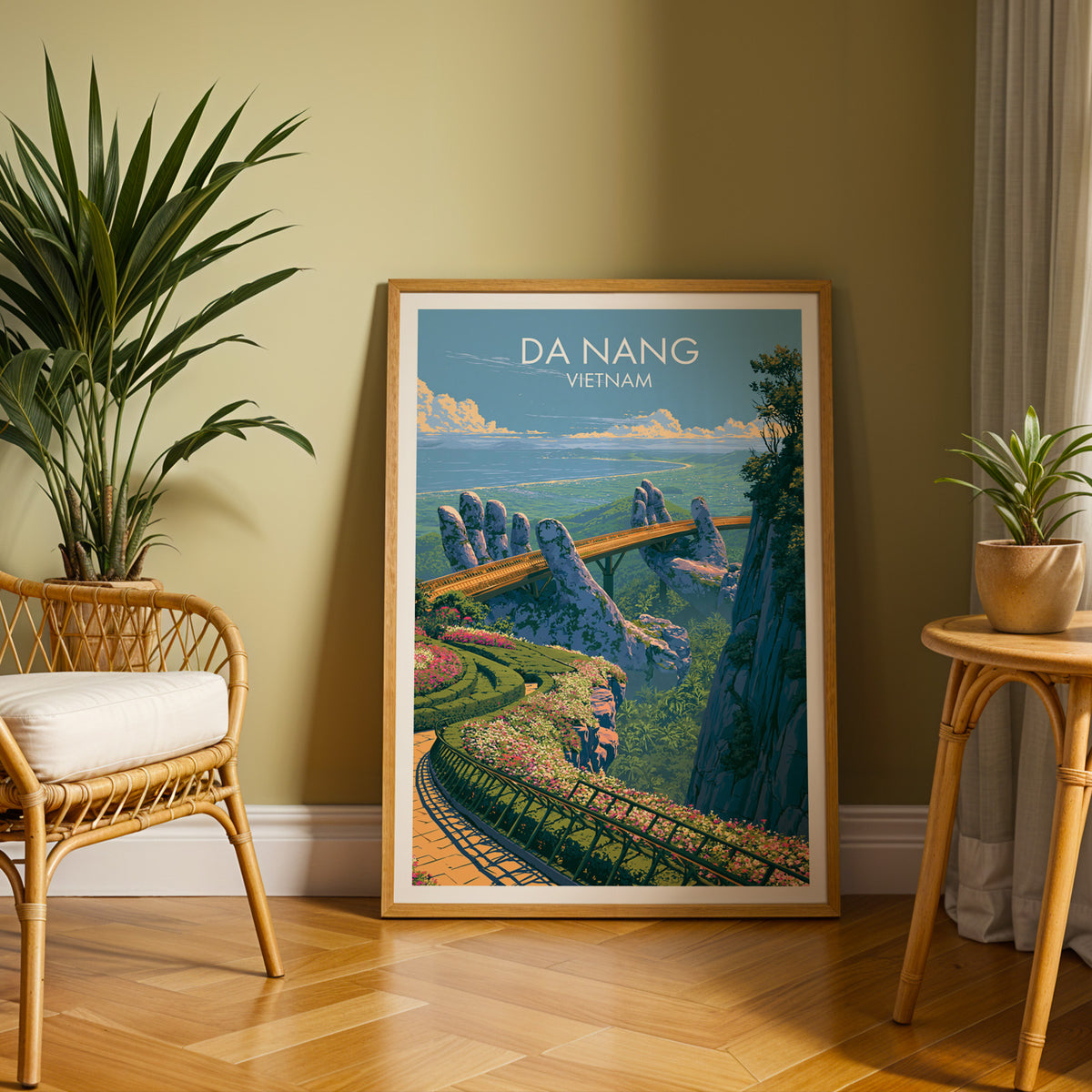 Vietnam travel poster in an oak frame on a herringbone floor by a rattan chair and yucca, olive wall
