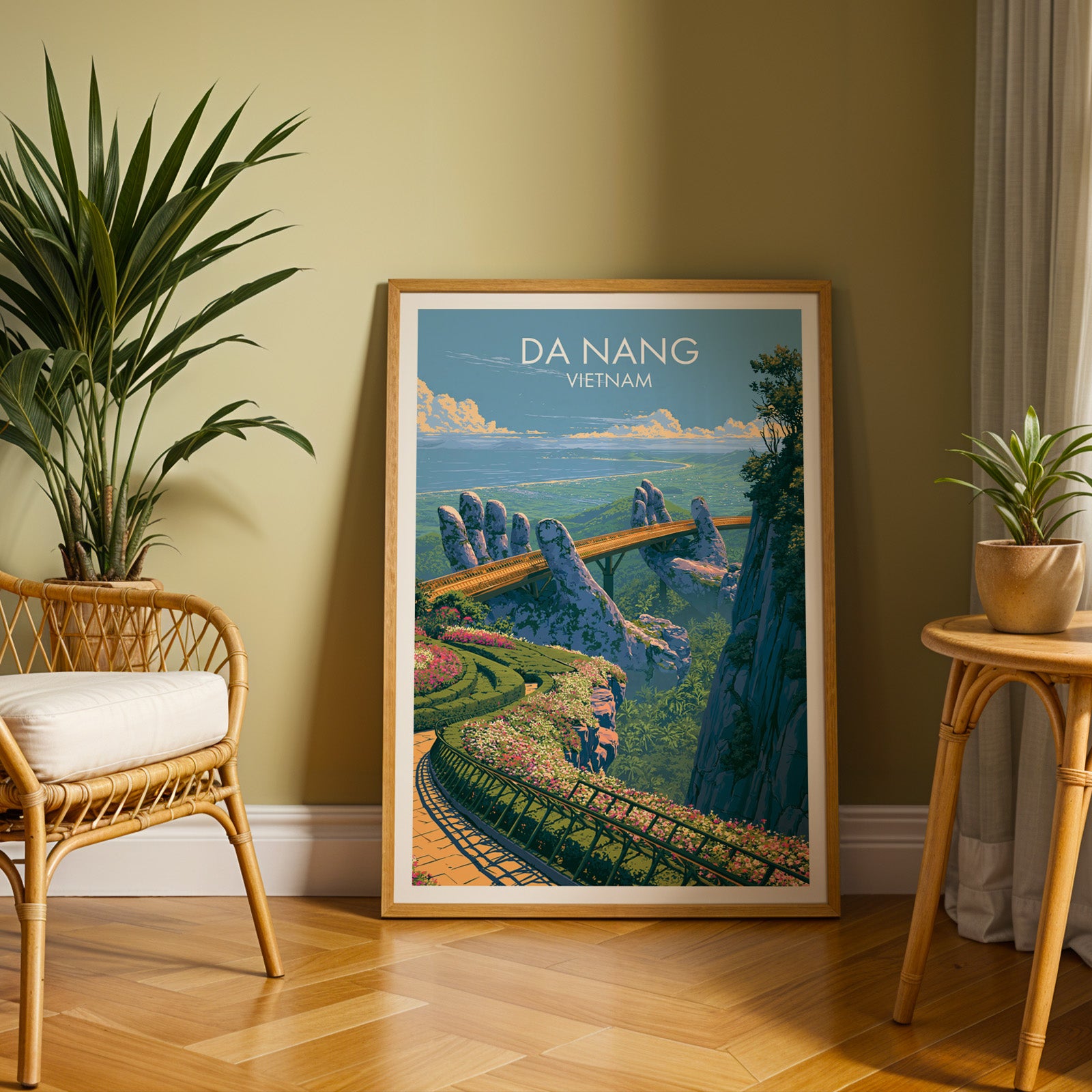Large Golden Bridge Da Nang Vietnam travel print in an oak frame leaning on a herringbone floor next to a rattan chair