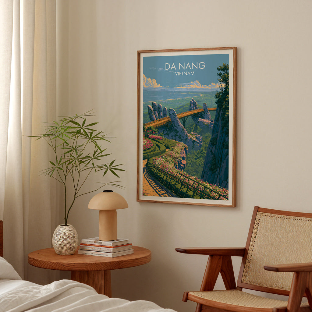 Golden Bridge Da Nang Vietnam poster above a bedroom nightstand with a bamboo plant and mushroom lamp