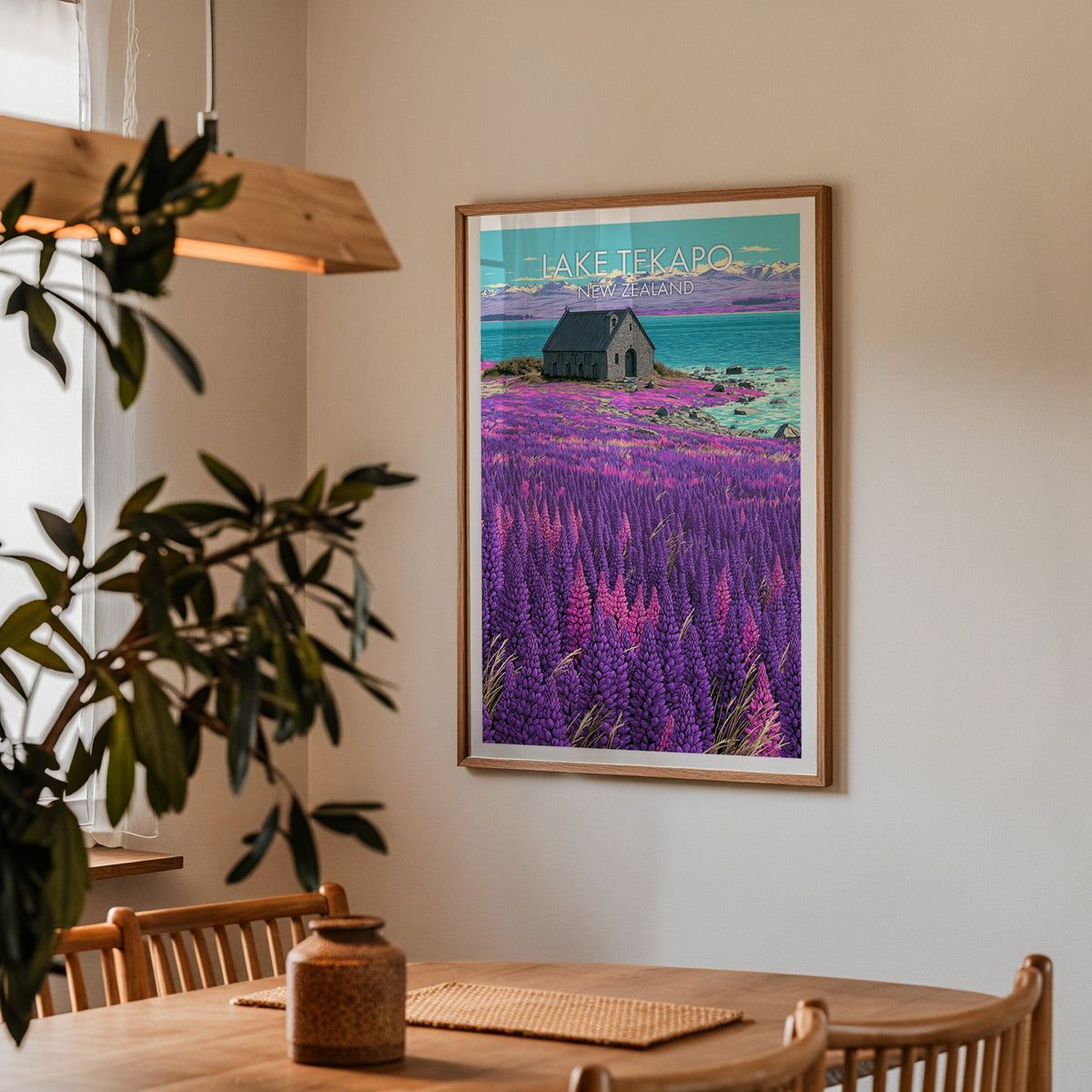 Lupins and chapel poster in oak above an oak dining table with spindle chairs and a wood pendant