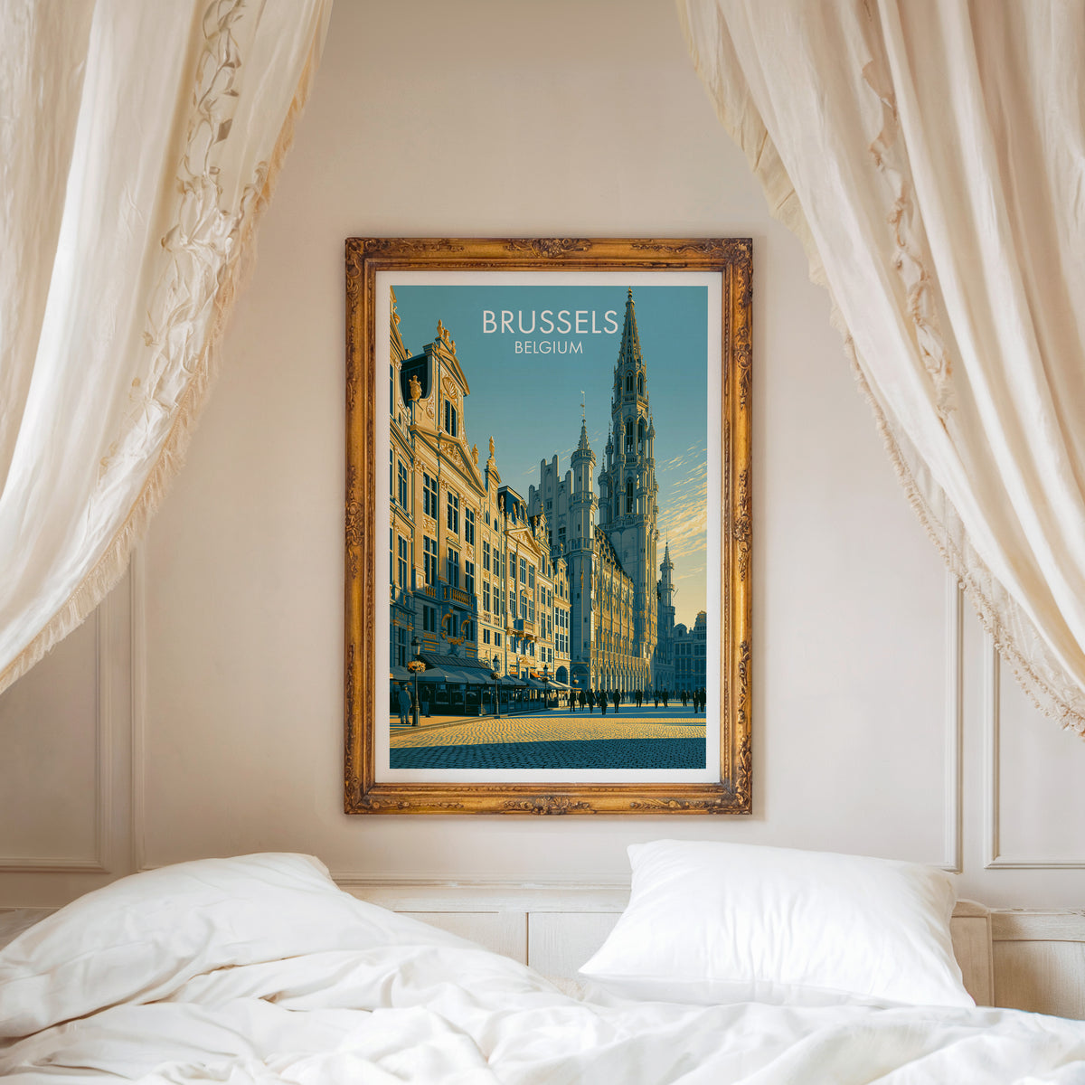 Grand Place travel poster, ornate gold frame above a white bed with linen canopy curtains