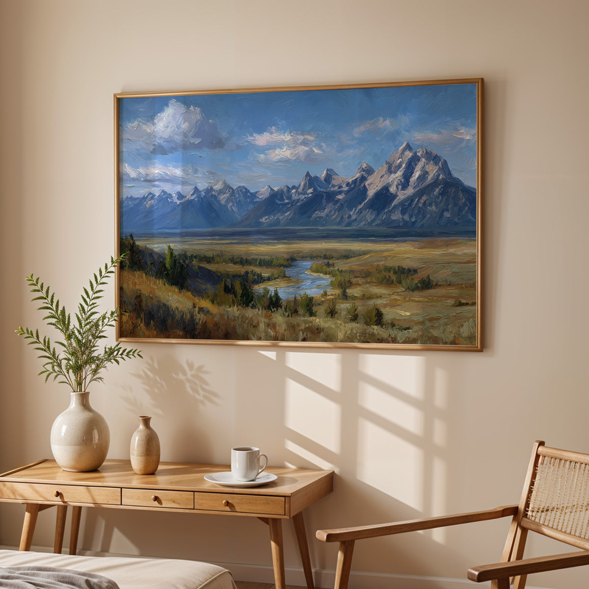Grand Teton National Park canvas print in a dark walnut frame above a cream sofa