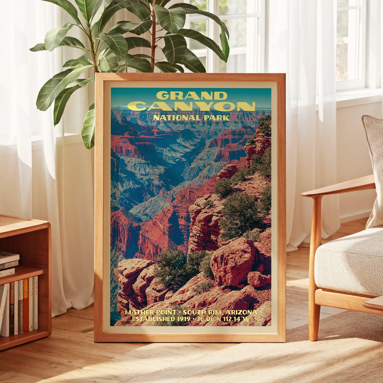 Grand Canyon vintage poster in oak, leaning by a sunlit window with sheer curtains and a low bookshelf