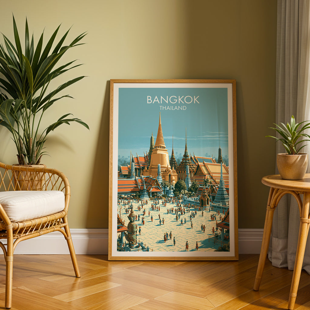 Large Grand Palace Bangkok Thailand travel print in an oak frame leaning on a herringbone floor next to a rattan chair