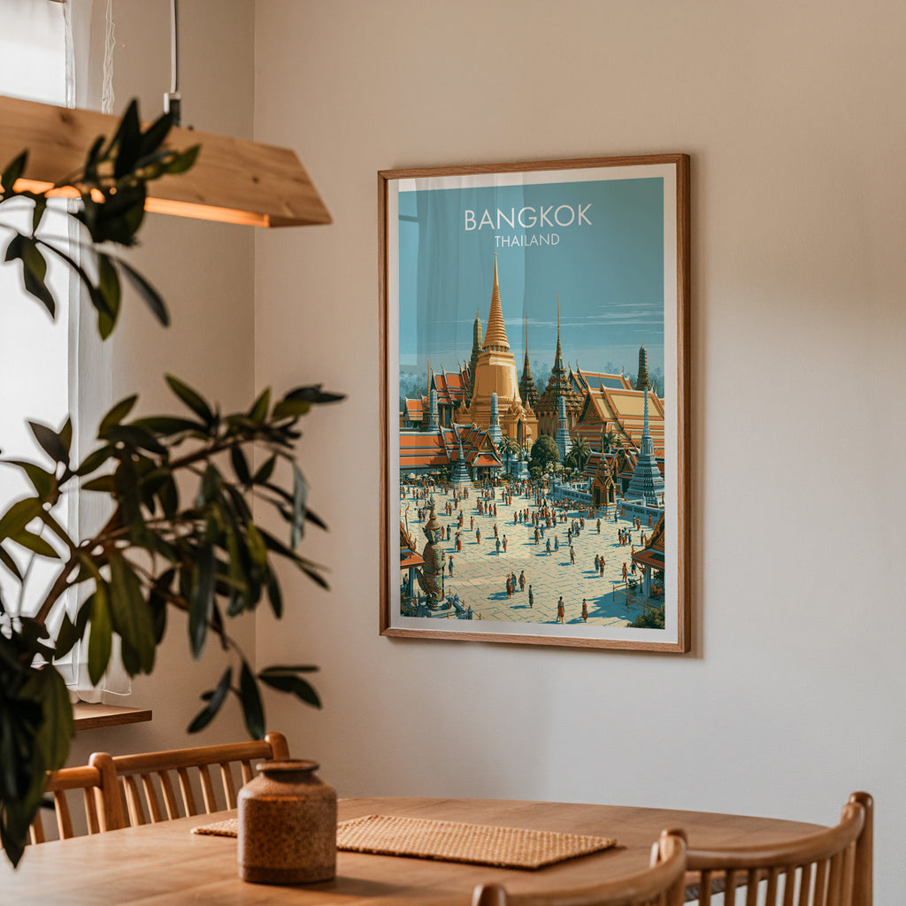 Framed Grand Palace Bangkok Thailand print on a dining room wall above an oak table in warm afternoon light