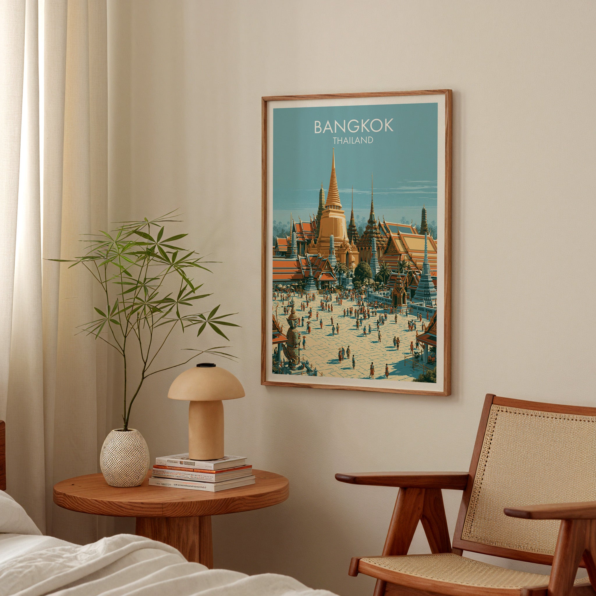 Grand Palace Bangkok Thailand poster above a bedroom nightstand with a bamboo plant and mushroom lamp