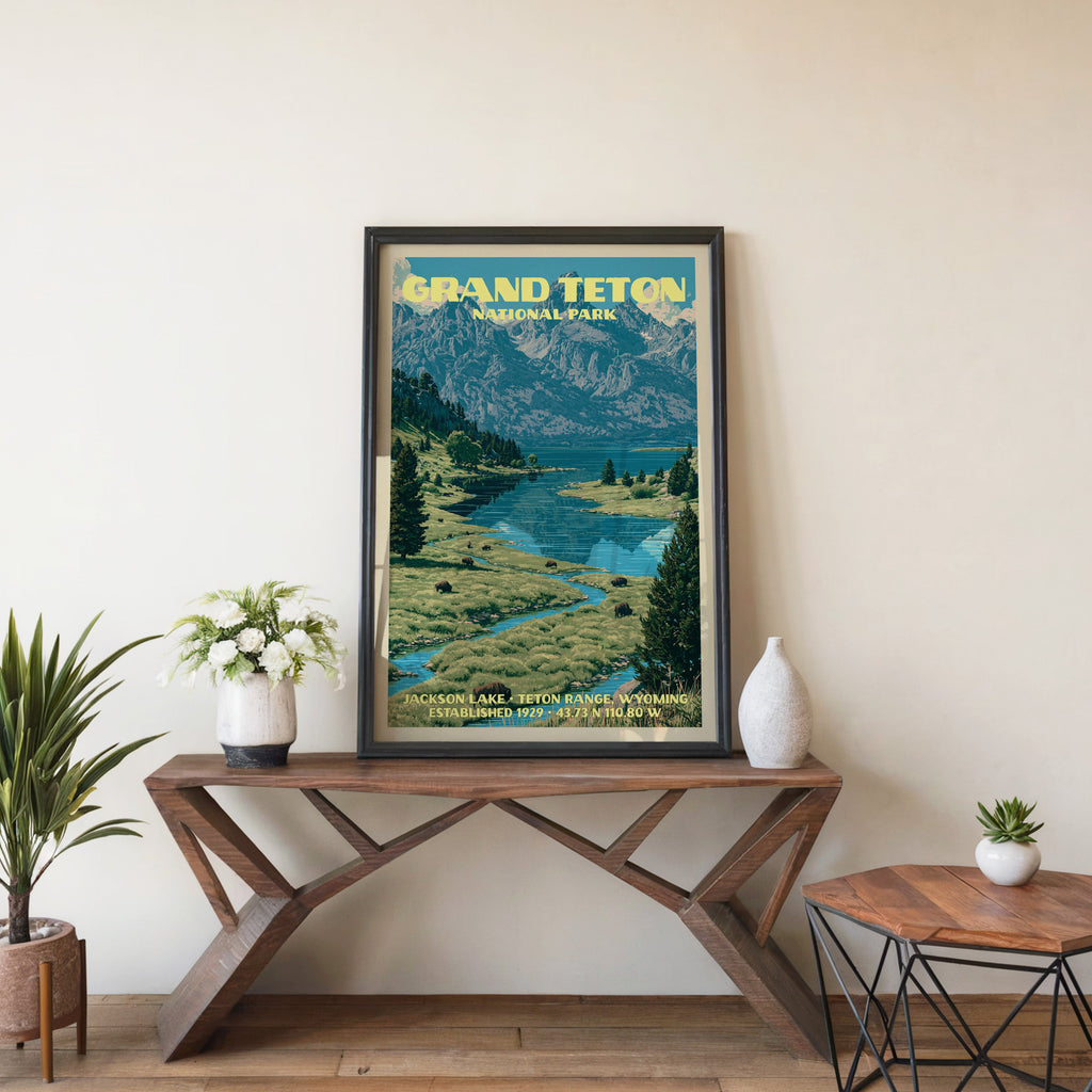 Grand Teton Jackson Lake wall art in black, leaning on a walnut console with white anemones in a vase