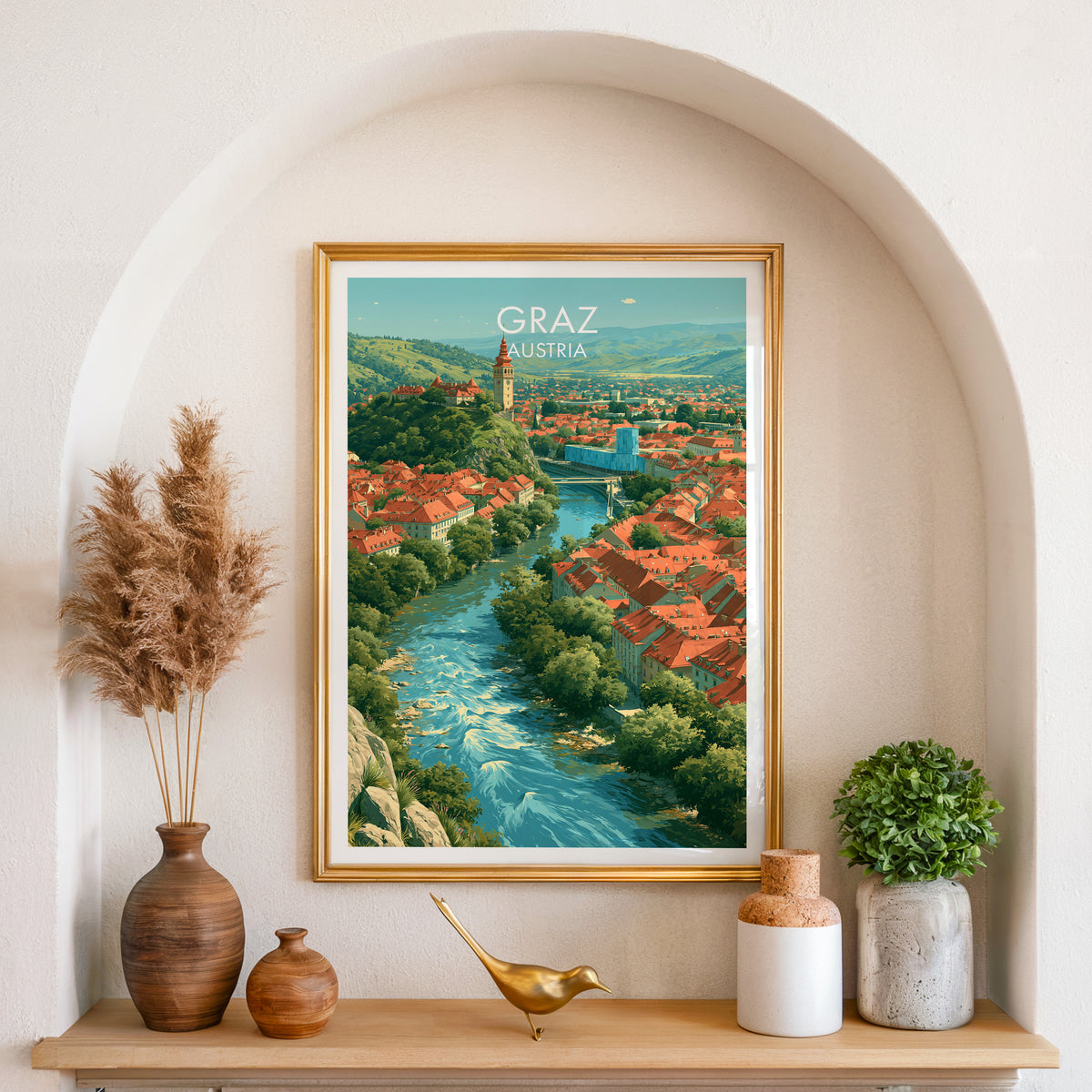Graz Mur river poster, gold frame in an arched wall niche above pampas grass in a clay vase