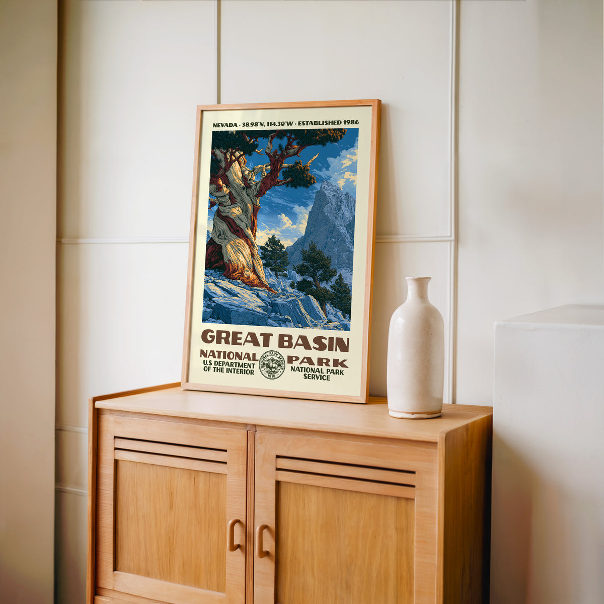 Great Basin National Park WPA print framed in light oak on a wooden sideboard with a ceramic vase