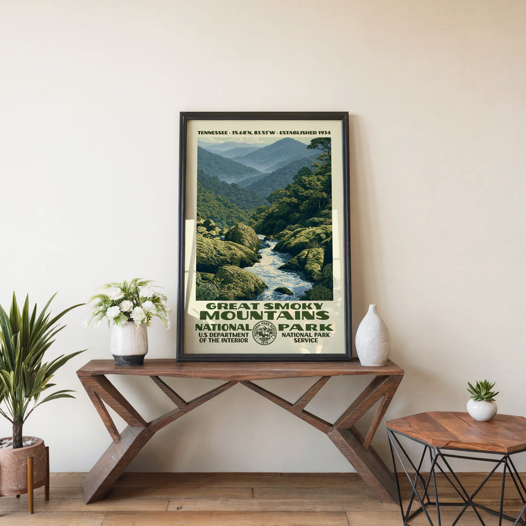 Great Smoky Mountains National Park travel poster in a black frame on a wood console table with houseplants