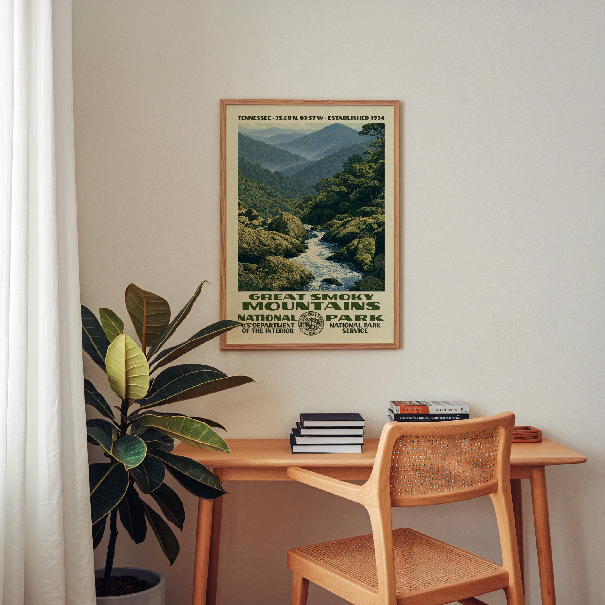 Great Smoky Mountains National Park retro poster framed above a wooden home office desk with books and plants