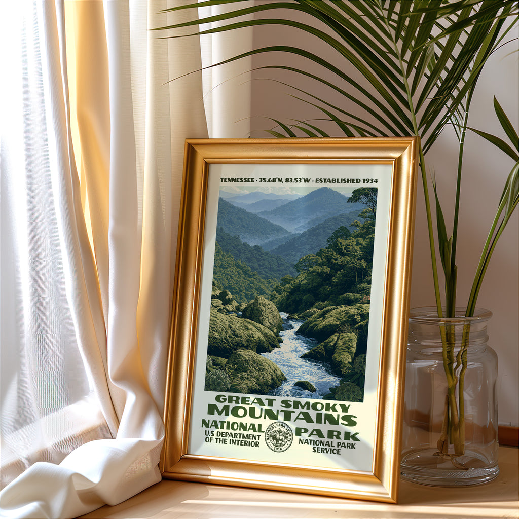 Great Smoky Mountains National Park vintage poster in a gold frame beside a linen curtain and potted palm