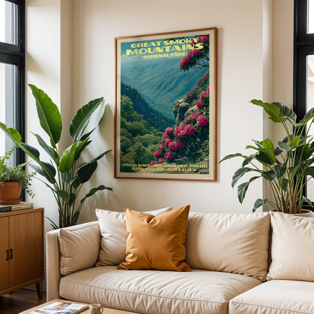 Great Smoky Mountains vintage travel print in oak above a cream sofa with a rust cushion and tall tropical plants