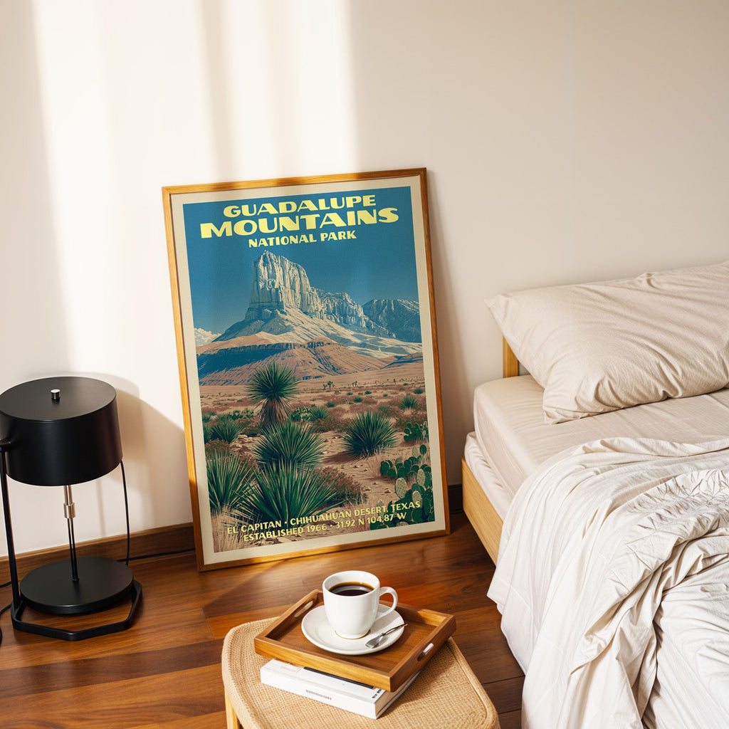 El Capitan Texas poster in a gold frame on the bedroom floor beside a made bed and a black table lamp