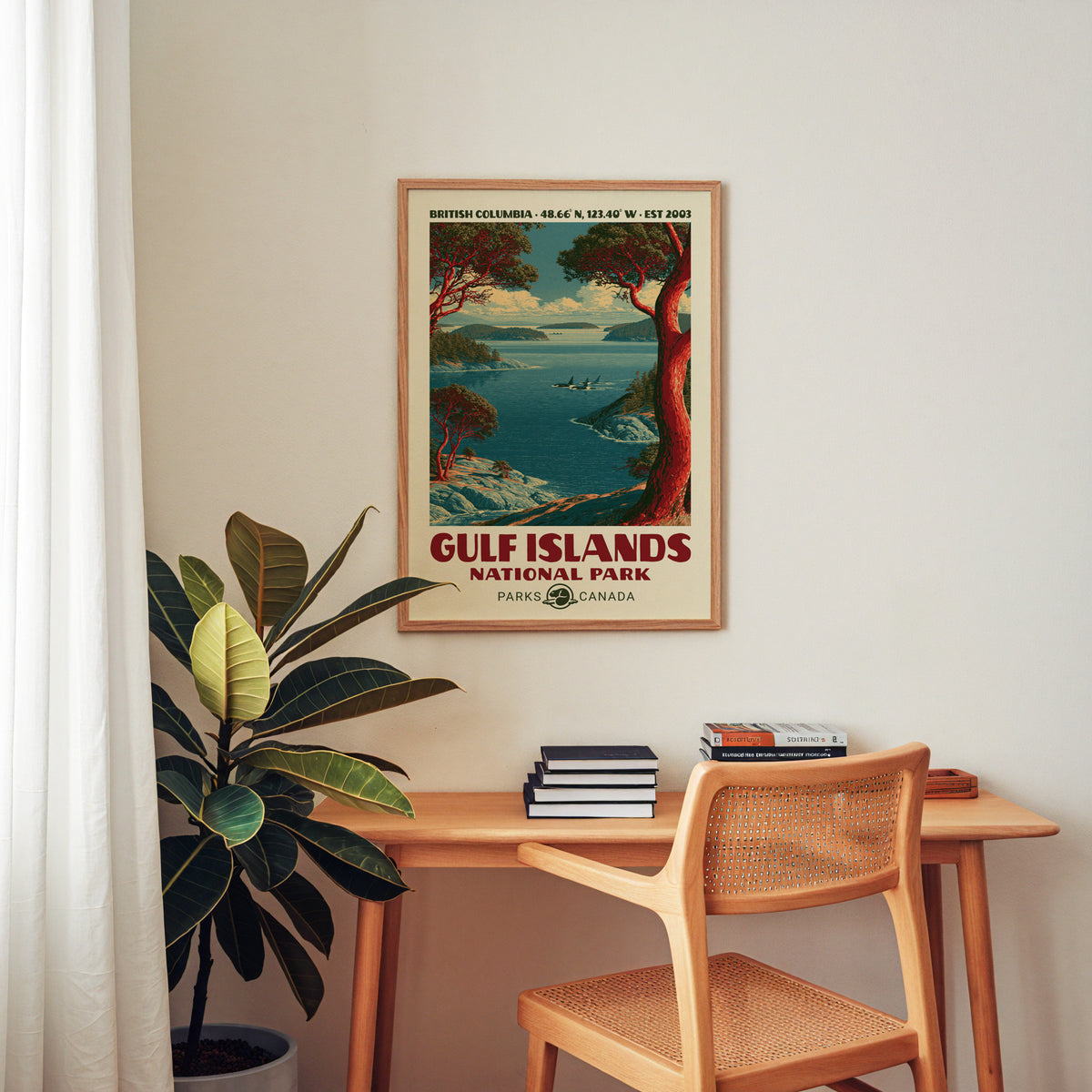 Gulf Islands National Park canvas print in an oak frame above a wood desk with a cane chair