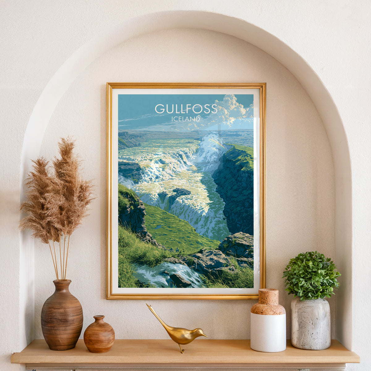 Gullfoss poster, gold frame in an arched wall niche above pampas grass in a clay vase