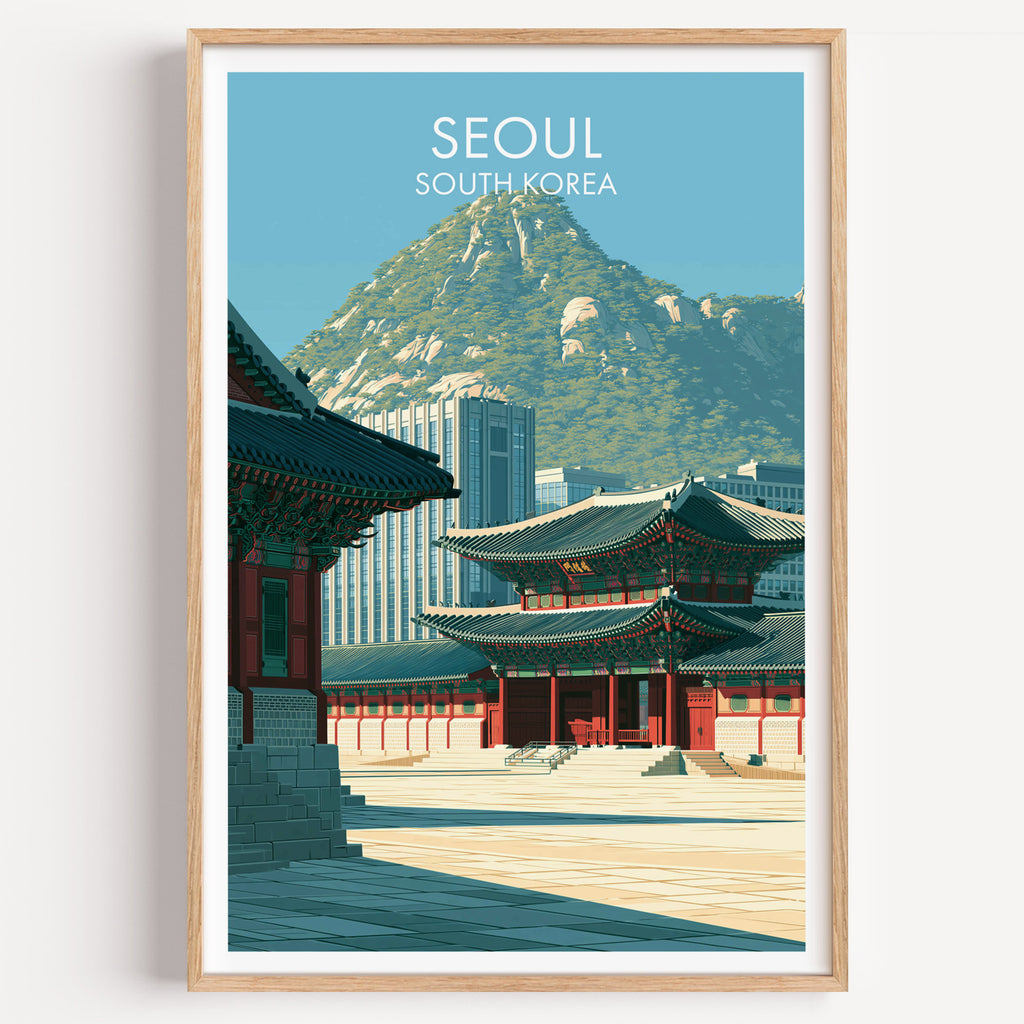 Gyeongbokgung Palace Seoul travel poster in a natural wood frame, shown against a clean white wall