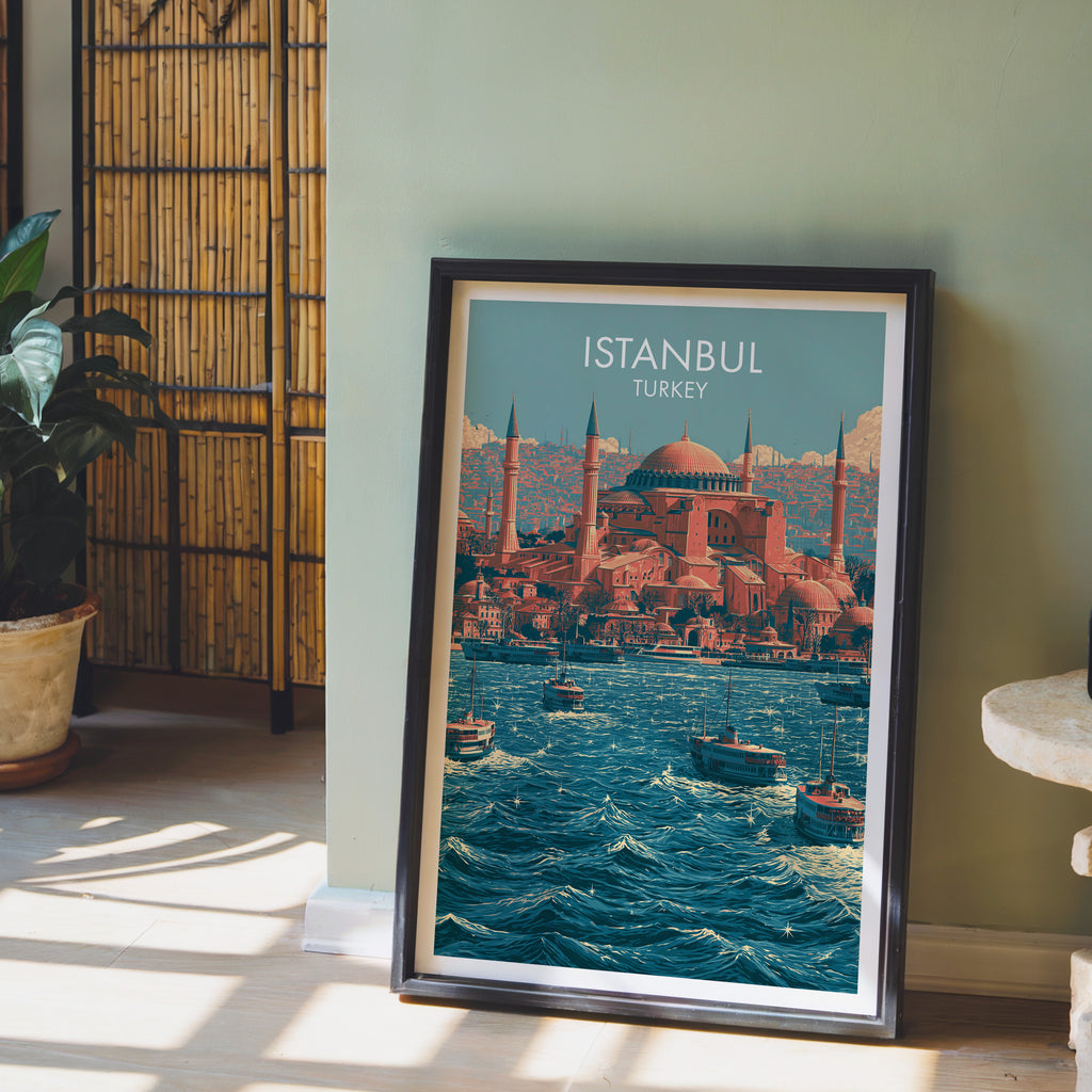 Hagia Sophia Istanbul Turkey wall art in a black frame leaning against a sage green wall beside a bamboo screen