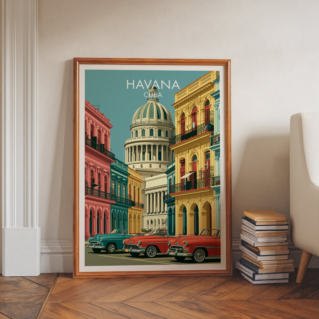 Capitolio dome artwork in a walnut frame leaning on herringbone floor with stacked books and a pale armchair