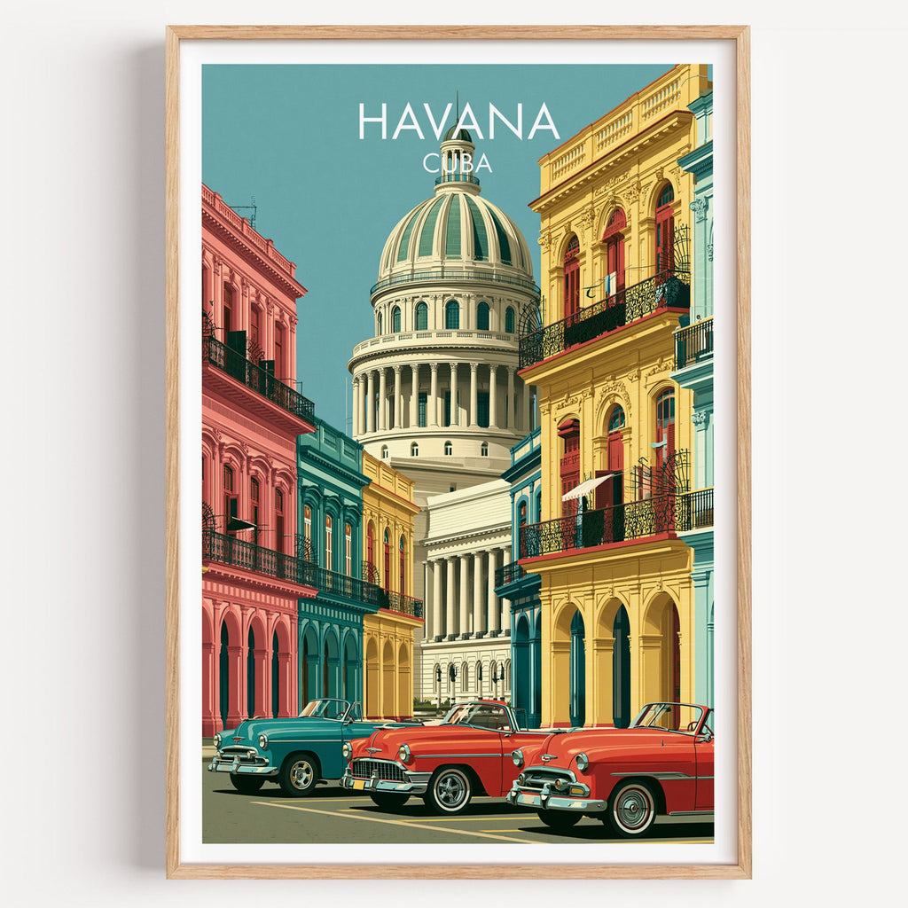 Havana travel print of the Capitolio dome and classic cars in a light oak frame on a plain white wall