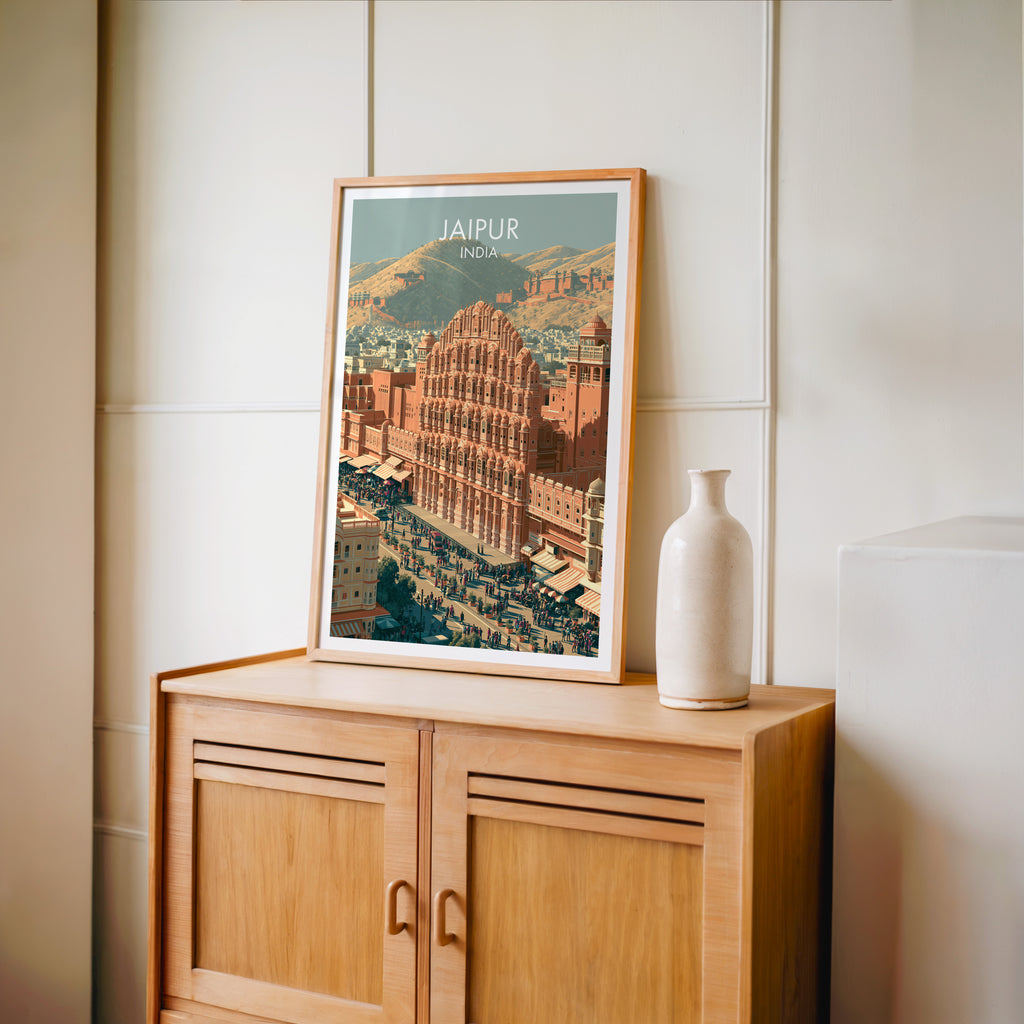 Small Hawa Mahal Jaipur India travel poster in an oak frame on a mid-century sideboard with a ceramic vase