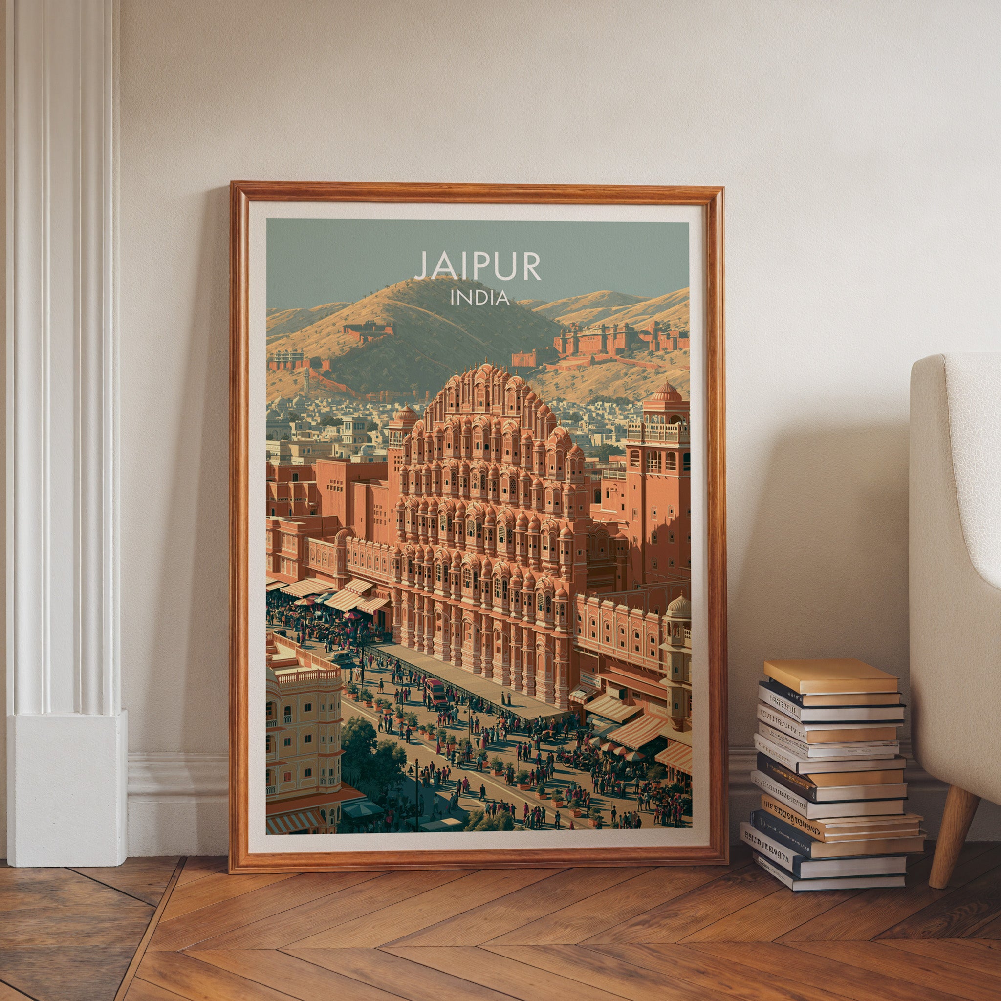 Hawa Mahal Jaipur India art print in a walnut frame leaning in a hallway beside stacked books